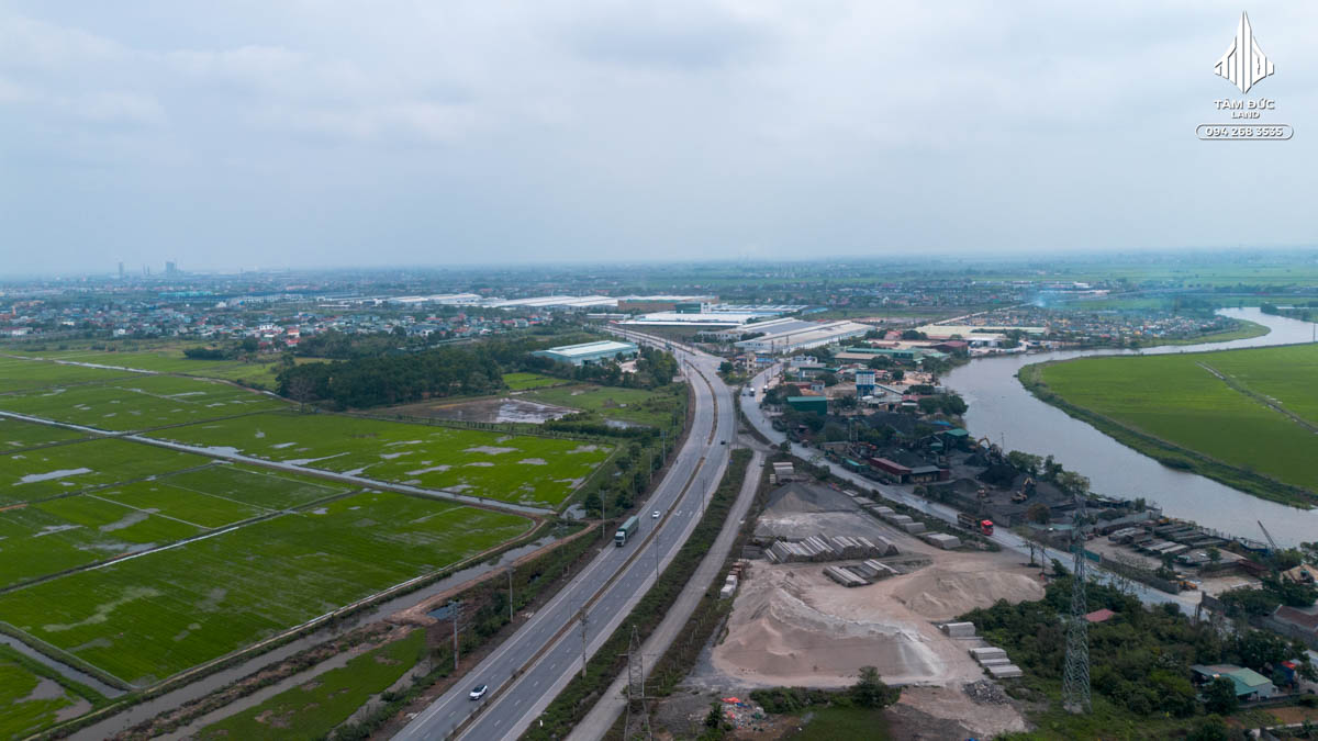 Aerial view of rural landscape and buildings.